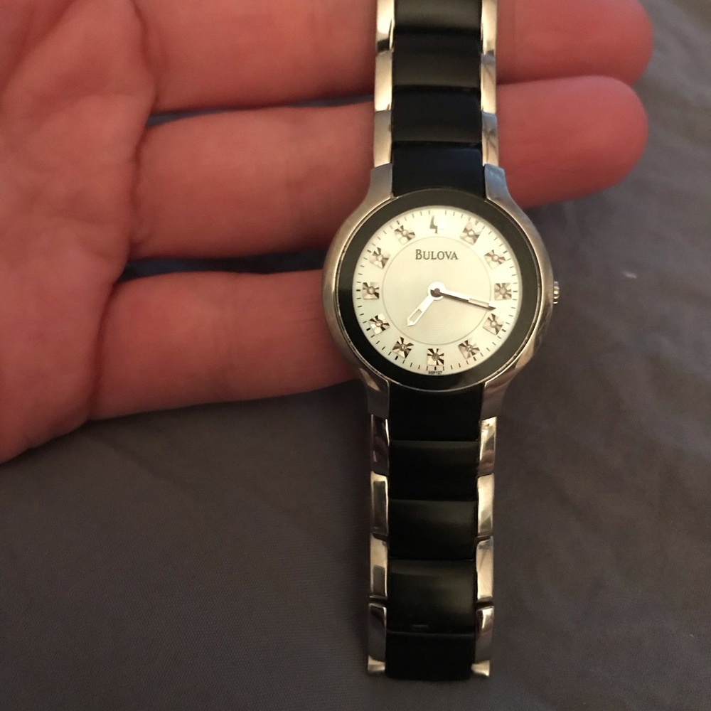Bulova water-resistant, stainless steel watch.